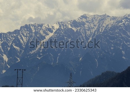 Panorama of Snow Mountain Range Landscape with Blue Sky from Pilatus Peaks Alps Lucern Switzerland. Mountain covered with thick white snow. Indian Himalayas.