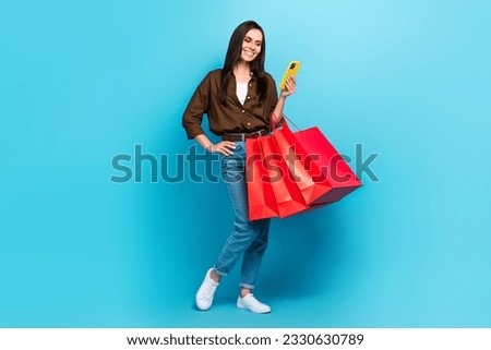 Full size body photo of shopaholic girl brands adidas nike reebok promo advert sale online 6pm website isolated on blue color background