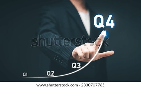 Business Profit growth, Financial report, Fourth quarter Concept. Business man point 4th quarter positive growth performance report, increasing financial, Q4, stock, analysis, Business chart, success. Royalty-Free Stock Photo #2330707765