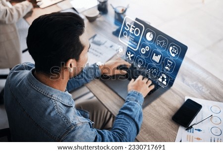 SEO, digital and businessman with laptop in an office for analysis, email or work on technology. Website, corporate and an employee typing on a computer for marketing or professional market research Royalty-Free Stock Photo #2330717691