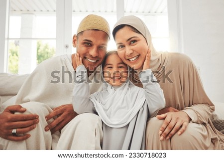 Portrait of parents, child on sofa and Islam, smile for Eid with mom, dad and daughter with home culture in Indonesia. Muslim man, woman in hijab and kid, happy family at Ramadan on sofa together. Royalty-Free Stock Photo #2330718023