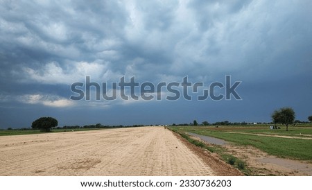 Beautiful Rainy Clouds View in village 