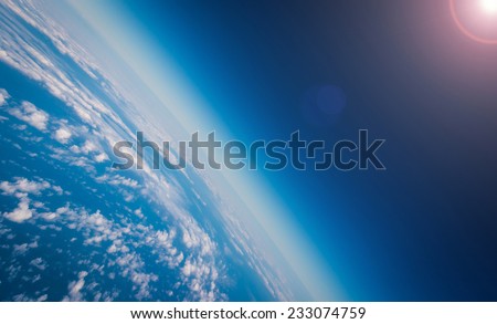 Earth Planet And Sun Royalty-Free Stock Photo #233074759