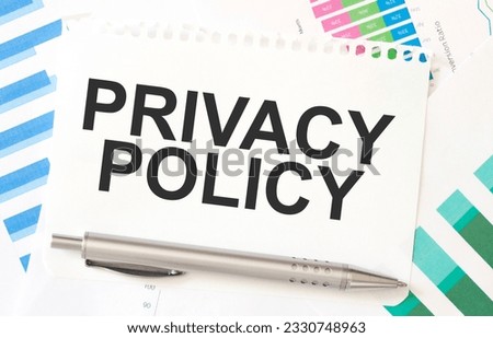 PRIVACY POLICY on paper sheet on charts
