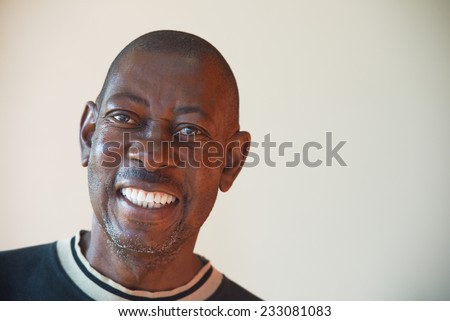 Portrait of an elderly African cheerful men