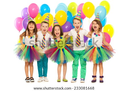 Group of joyful little kids having fun at birthday party. Isolated on white background. Holidays, birthday concept.