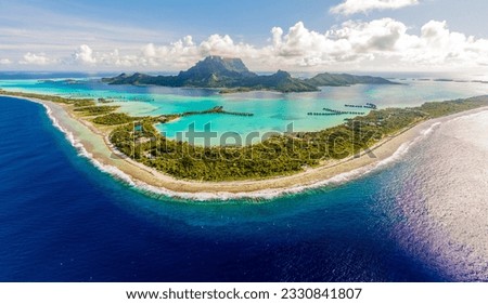 Aerial view of Bora Bora, French Polynesia, its famous lagoon, Mount Otemanu, and the surrounding motus (islets) Royalty-Free Stock Photo #2330841807