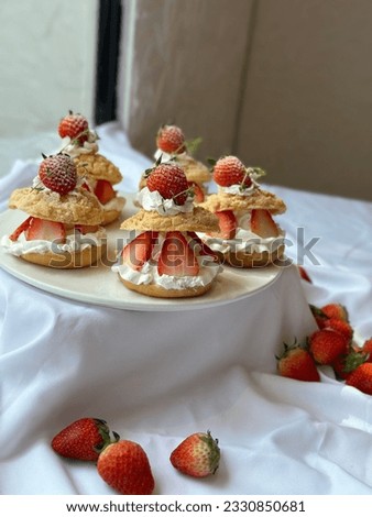 Chu cream fresh strawberry. Strawberry chu cream recipe in a plate on white background. Closeup chu cream and strawberry with vanilla cream. Bakery picture free space for text.