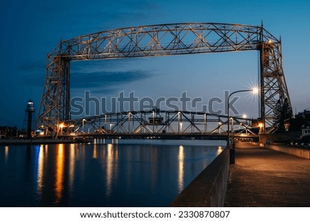 An evening view of Duluth Aerial Lift Bridge, constructed in 1901-1905. Royalty-Free Stock Photo #2330870807
