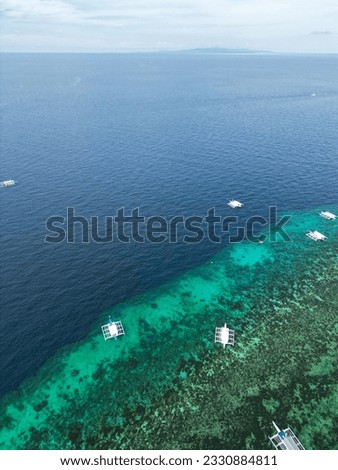Beauty The Philippine sea and aerial photographs of traditional Philippine ship Banca (hopping boat), and graphic patterns,