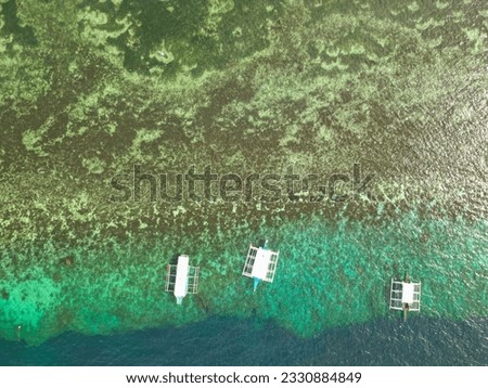 Beauty The Philippine sea and aerial photographs of traditional Philippine ship Banca (hopping boat), and graphic patterns,
