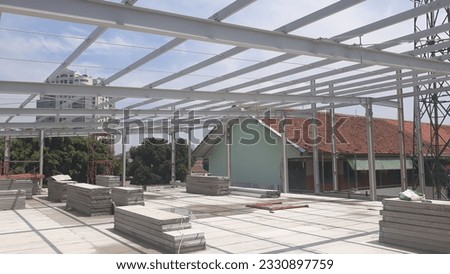 A steel profile structure is used on the 2nd floor of a vocational school in South Jakarta. Royalty-Free Stock Photo #2330897759