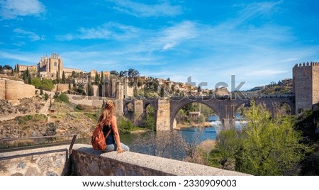Woman tourist in Toledo city- Spain Royalty-Free Stock Photo #2330909003