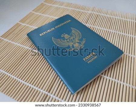 Green passport of the Republic of Indonesia, isolated on background.
