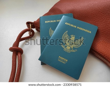 Green passport of the Republic of Indonesia, isolated on background.