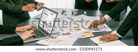Analyst team use sticky note for creative and analytic brainstorm for business idea with BI data dashboard on laptop screen. Analysis financial data visualization tech for marketing strategy. Prodigy