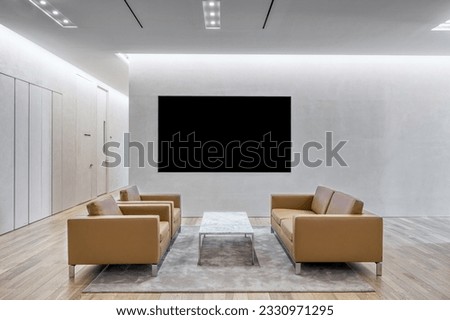  lounge interior with Big screen TV. Mock up blank tv display. Royalty-Free Stock Photo #2330971295