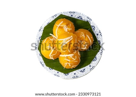 Close-up in top view picture of dessert of Thailand country with the Toddy Palm Cake put on banana leaf in dish in white background.copy space or main object.clippings path.