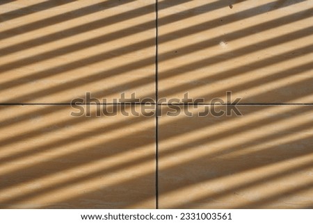 Photo of seamless pattern of sunlight shadow
