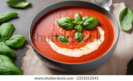 Steaming Bowl of Creamy Tomato Basil Soup Royalty-Free Stock Photo #2331012541