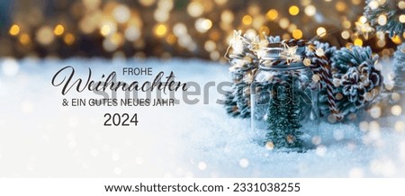 Christmas greeting card with text in German - Frohe Weihnachten means Merry Christmas and Happy New Year 2024 - Beautiful xmas decoration with Christmas tree in snow - Background banner, header