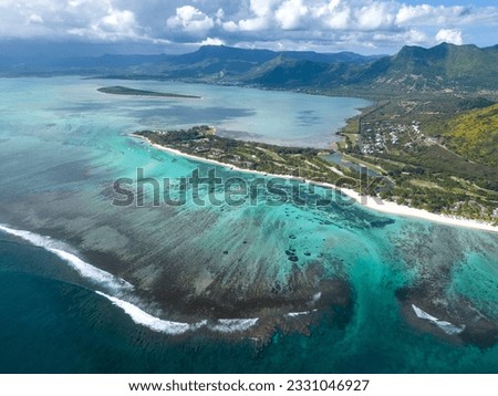 Incredible view of the famous underwater waterfall and Le Morne mountain in Mauritius. Picture taken from drone
