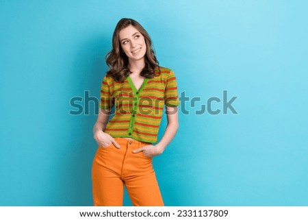 Photo of young girl wear trendy striped t-shirt preppy dreamy look mockup advert promo poster brand text isolated on blue color background