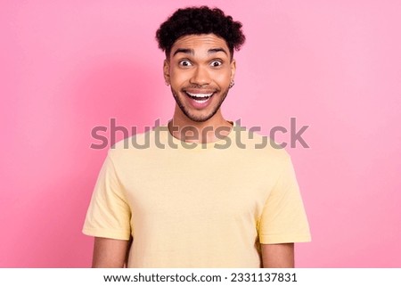 Photo of young hipster dude multinational student open mouth overjoyed wear summer yellow shirt isolated pink color background
