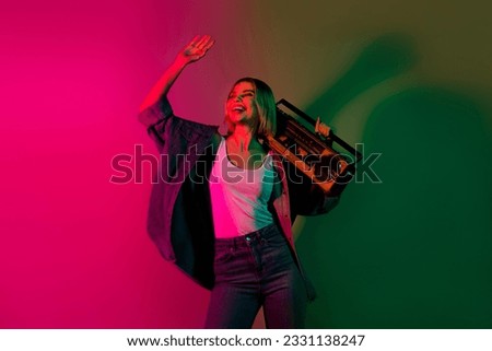 Photo of sweet excited lady wear denim jacket listen boom box songs isolated green pink gradient color background