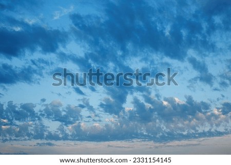 Cloudy sunset with stunning blue and orange colors