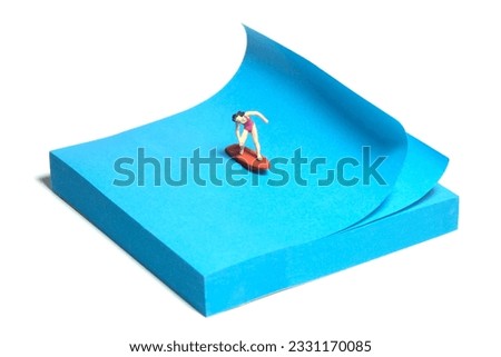 Creative miniature people toy figure photography. Sticky notes installation. A girl surfer riding big waves on surfing board. Isolated on white background. Image photo