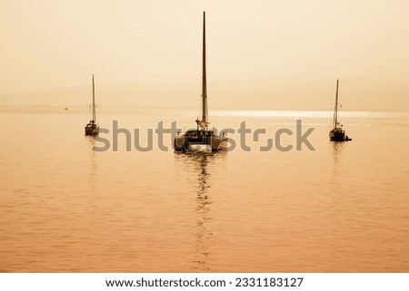 sailing boat anchored in a port in Sardinia