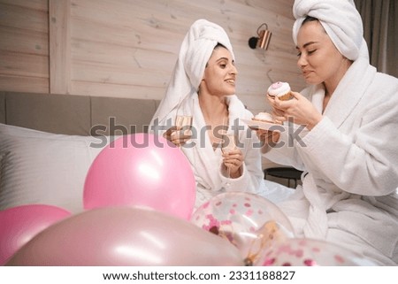 Happy women having fun celebrating birthday party
