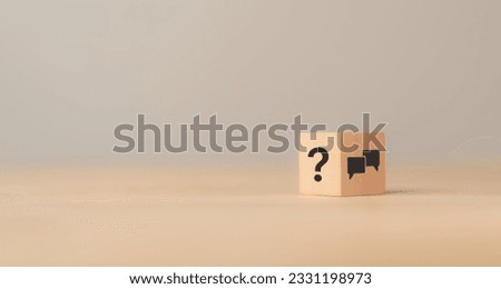 Q and A concept. Q and A symbols on wooden cube block on a grey background. Illustration for frequently asked questions concepts in websites, social networks, business issues. Recommendation concept. Royalty-Free Stock Photo #2331198973