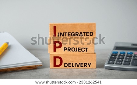 IPD Integrated Project Delivery system of cooperation and communication between participants in a construction project, investor, designer, contractor and all involved industries and suppliers