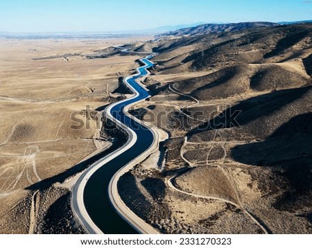 Aerial view of water carrying aqueduct in Outer Los Angeles, California. Royalty-Free Stock Photo #2331270323