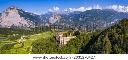 Italy travel destinations. Famous medieval castle Madruzzo in Trentino Alto Adige region province of Trento. Aerial panoramic drone view Royalty-Free Stock Photo #2331270427