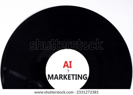 AI marketing symbol. Concept words AI artificial intelligence marketing on black vynil disk. Beautiful white table white background. Business AI artificial intelligence marketing concept. Copy space.
