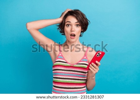 Photo of young confused girl forgot her icloud password hand head open mouth speechless big problem isolated on blue color background Royalty-Free Stock Photo #2331281307