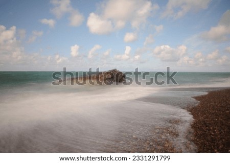 Bunker in the waves - longtime exposure  Royalty-Free Stock Photo #2331291799