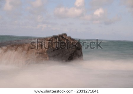 Bunker in the waves - longtime exposure  Royalty-Free Stock Photo #2331291841