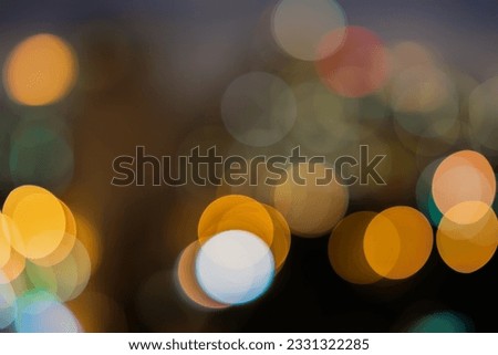 Abstract blur bokeh of city night lights. Multicolored glowing Bokeh lights background