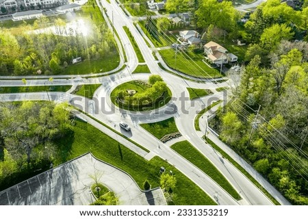 A drone view of a group of roundabouts and a highway Royalty-Free Stock Photo #2331353219