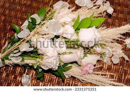 Beautiful and delicate bouquet of roses for the bride on her wedding day.