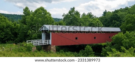 Bridge # 35-84-28
The Rinard Covered Bridge, near Marietta, Ohio, was built in 1876. It was added to the National Register of Historic Places in 1976.  Royalty-Free Stock Photo #2331389973