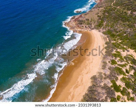 aerial view of beautiful beaches and cliffs at agnes water coast near the town of 1770 in gladstone region, queensland, australia; pristine beaches and unique sandy bays	 Royalty-Free Stock Photo #2331393813