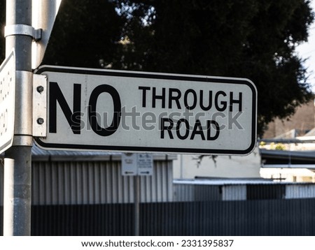 no through road sign. slight shadow coverage