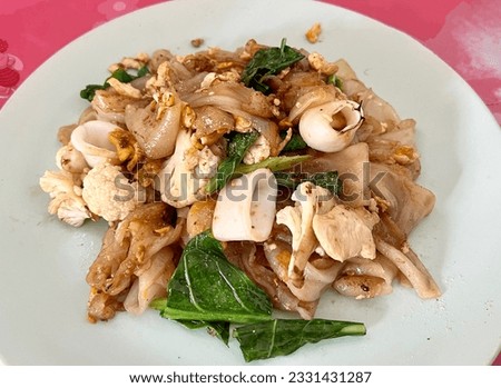stir-fried pork with kale, thai food.
