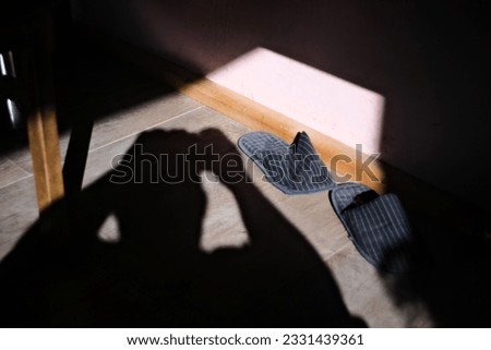 Shadow of a photographer on the floor 