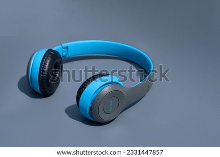 Generic wireless gaming headphones dark gray color isolated.